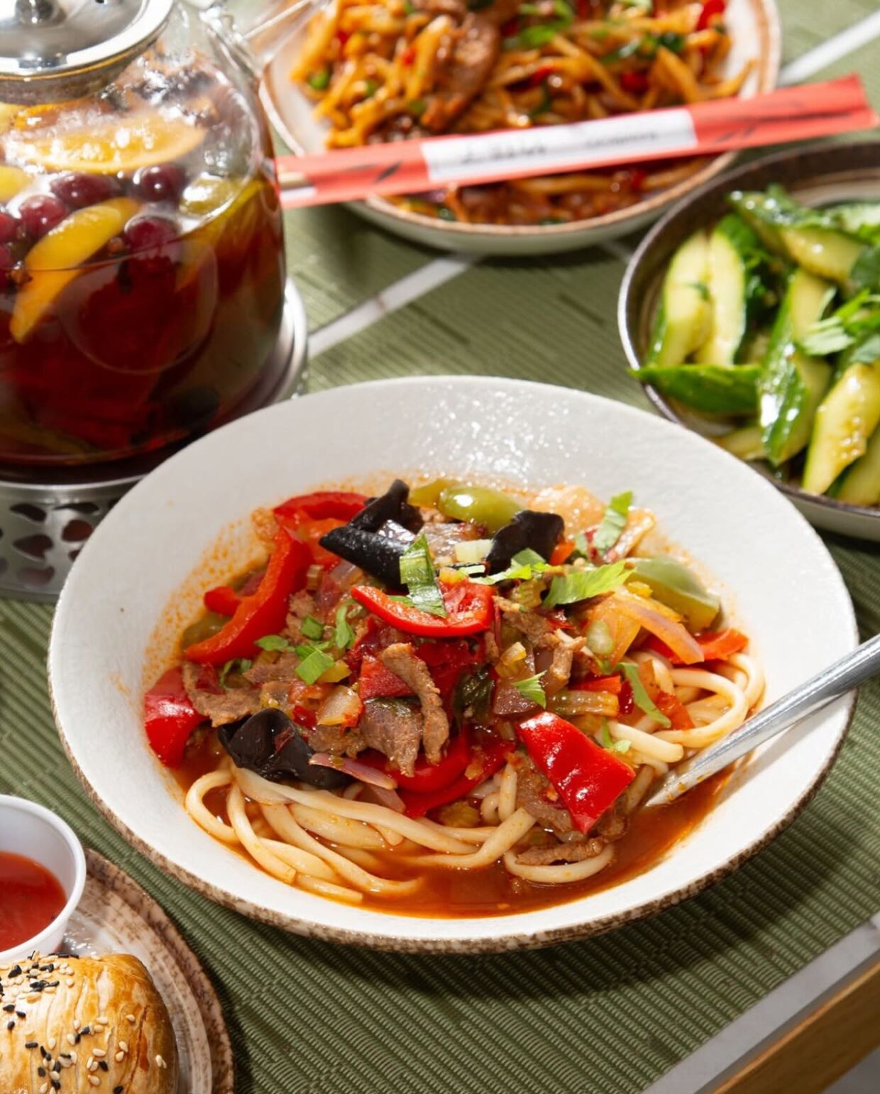 Bowl of Laghman hand-pulled noodles with beef and vegetables at Laghman Express Alpharetta